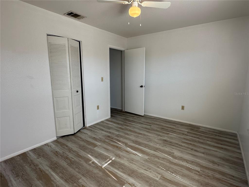 8100 Pickwick Road North Port, FL 34287 - Photo 10 of 15 a view of a room with wooden floor