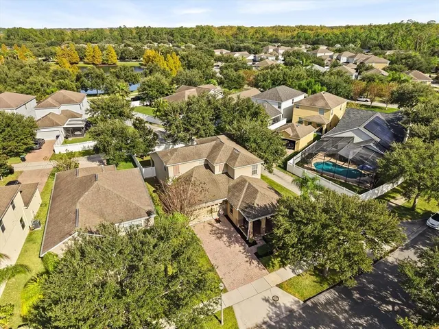 an aerial view of residential house with outdoor space