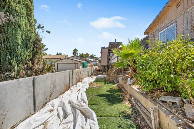a backyard of a house with seating space