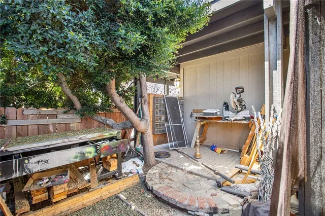 a view of walk in closet with clothes