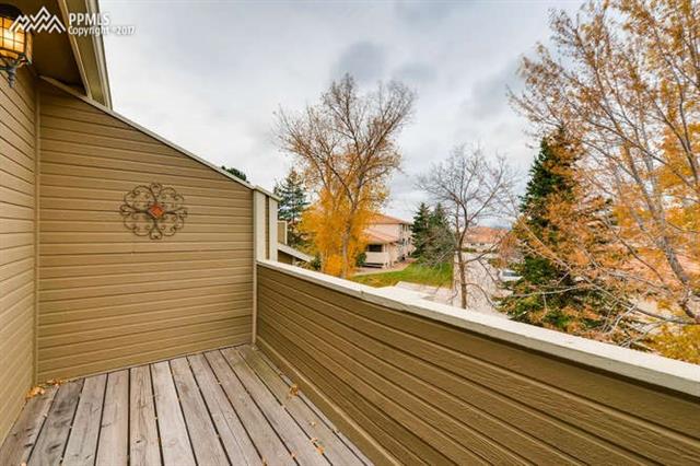 67 Rising Sun Terrace Colorado Springs, CO 80921 - Photo 14 of 26 Master Suite exits out to private deck with impressive Front Range views