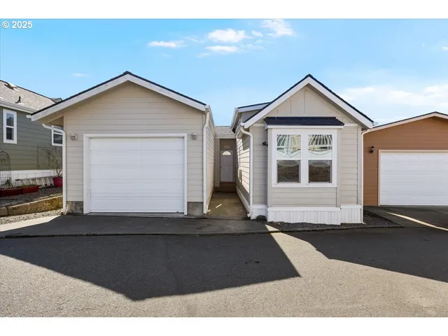 a black and white photo of a house