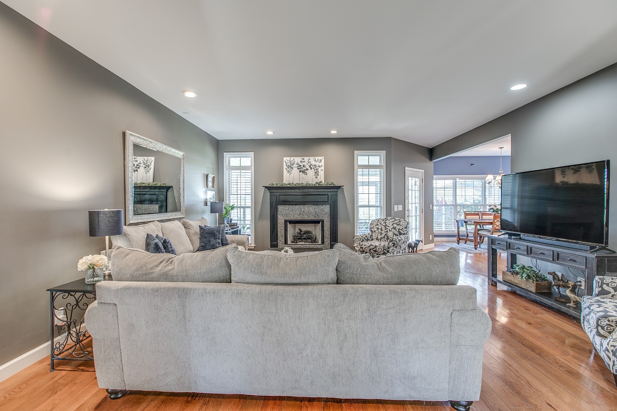 7285 North Milton Road Milton, TN 37118 - Photo 11 of 58 a living room with fireplace furniture and a flat screen tv