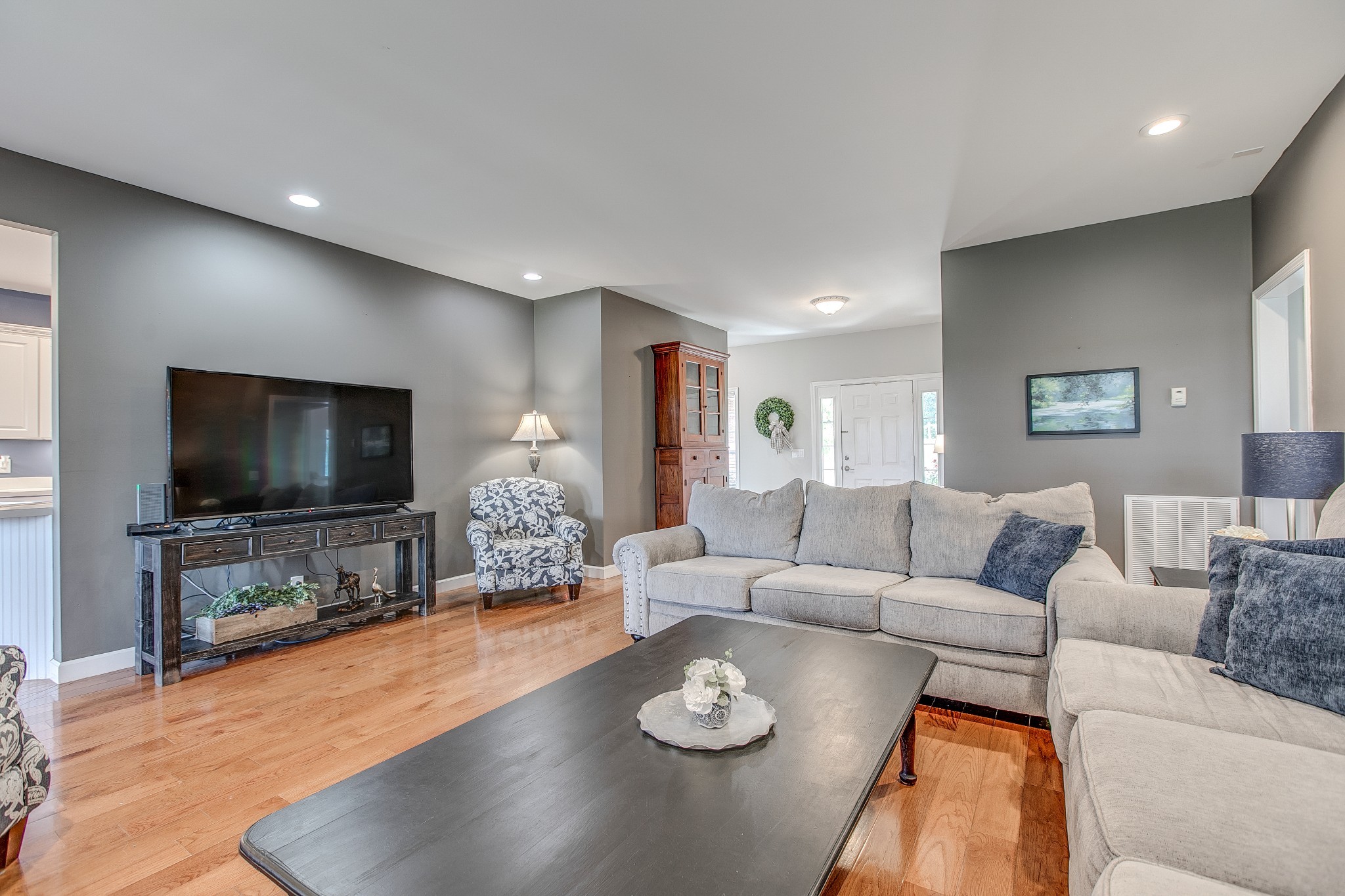 7285 North Milton Road Milton, TN 37118 - Photo 13 of 58 a living room with furniture and a flat screen tv
