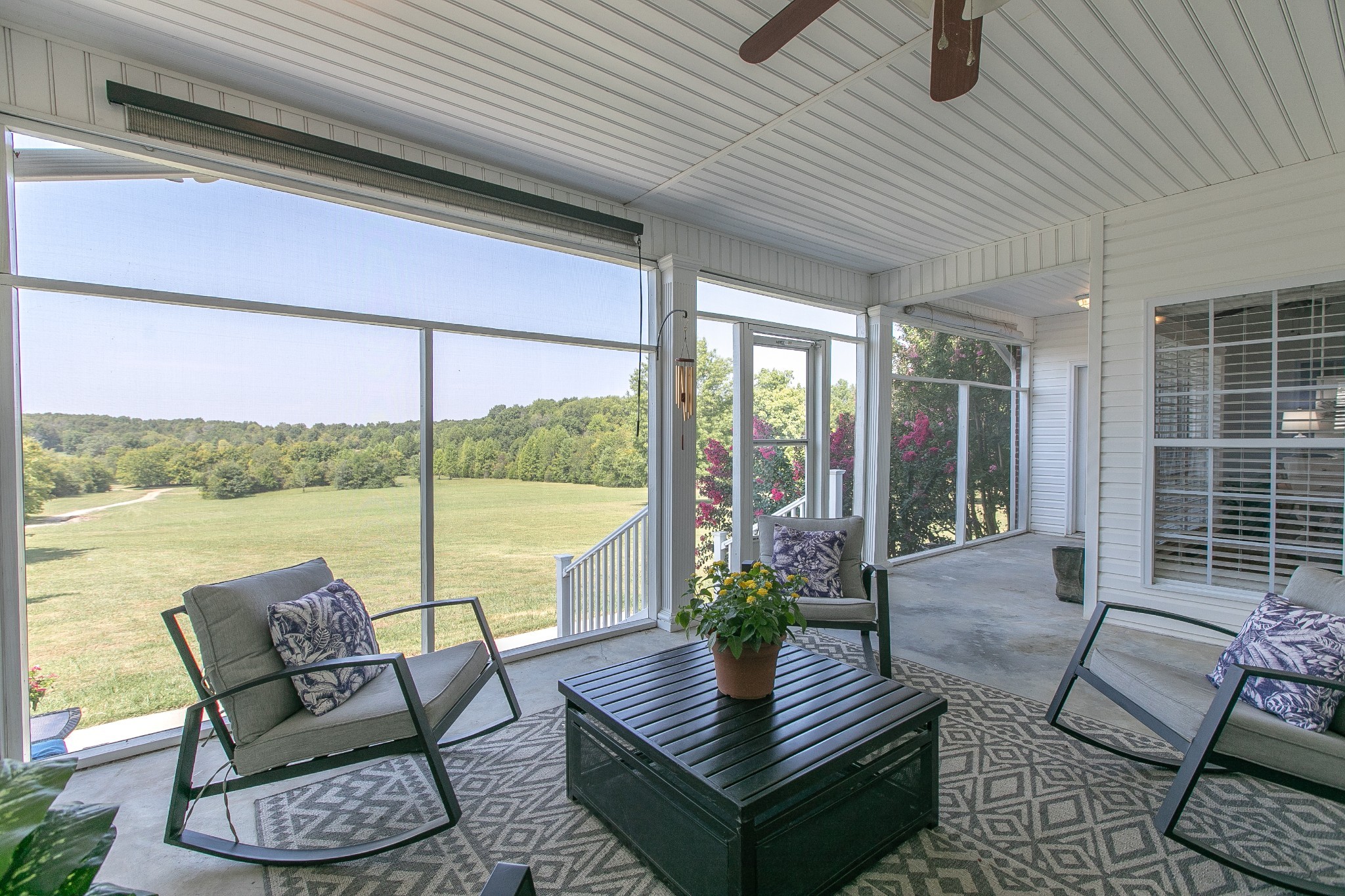 7285 North Milton Road Milton, TN 37118 - Photo 2 of 58 a view of a patio with couches chairs and a potted plant