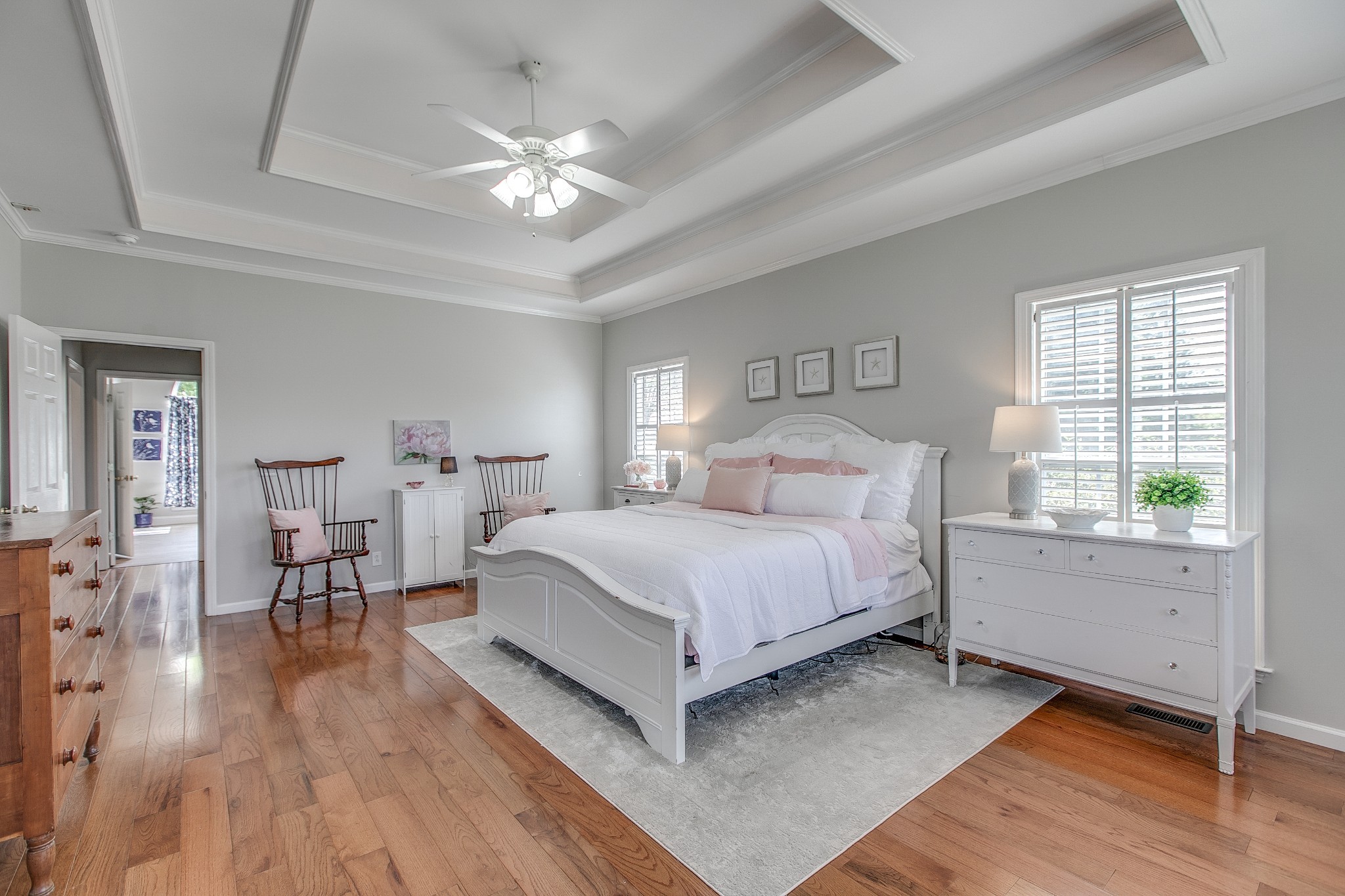 7285 North Milton Road Milton, TN 37118 - Photo 21 of 58 a bedroom with a large bed and a chandelier