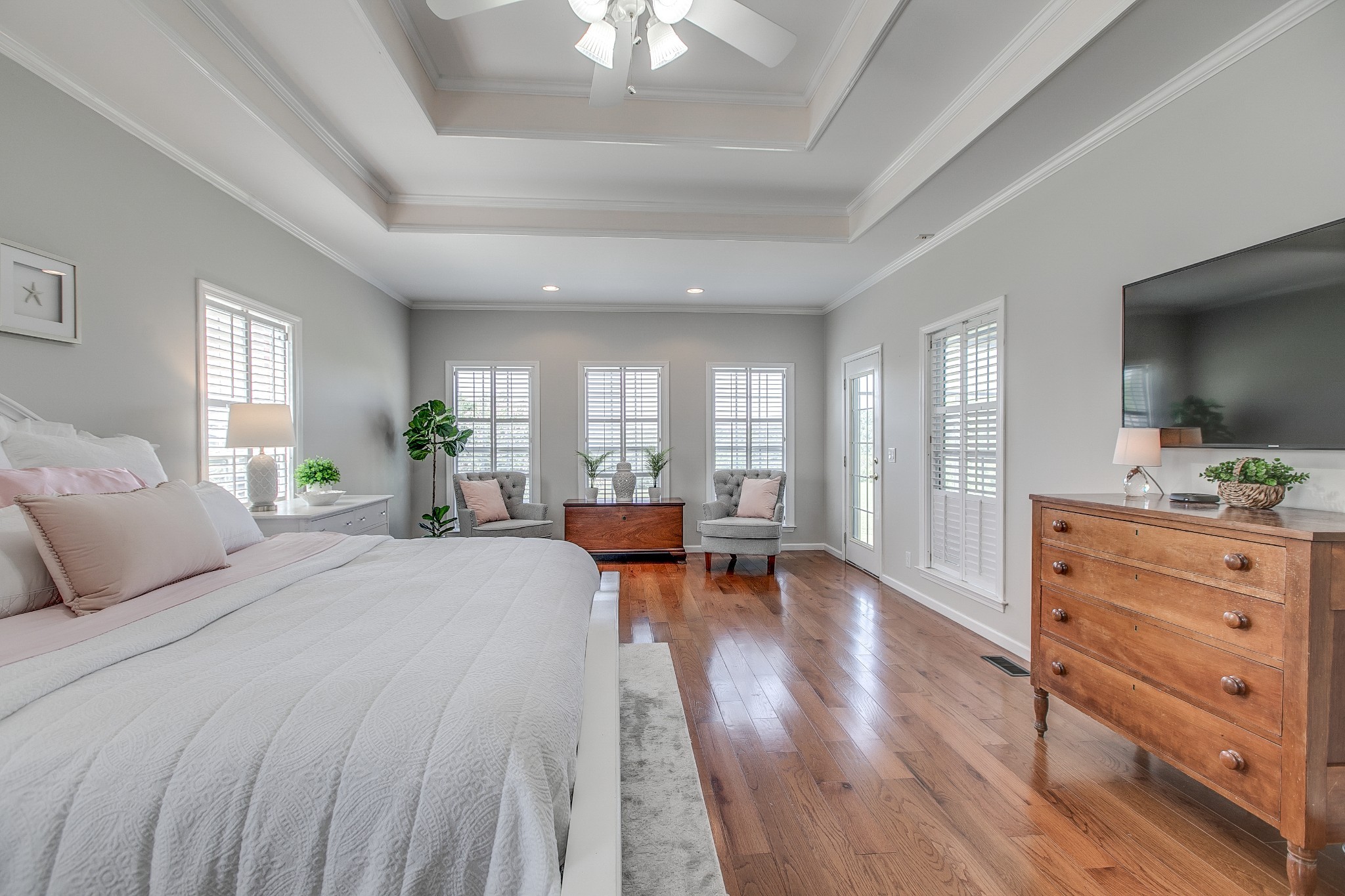 7285 North Milton Road Milton, TN 37118 - Photo 22 of 58 a spacious bedroom with a bed and wooden floor