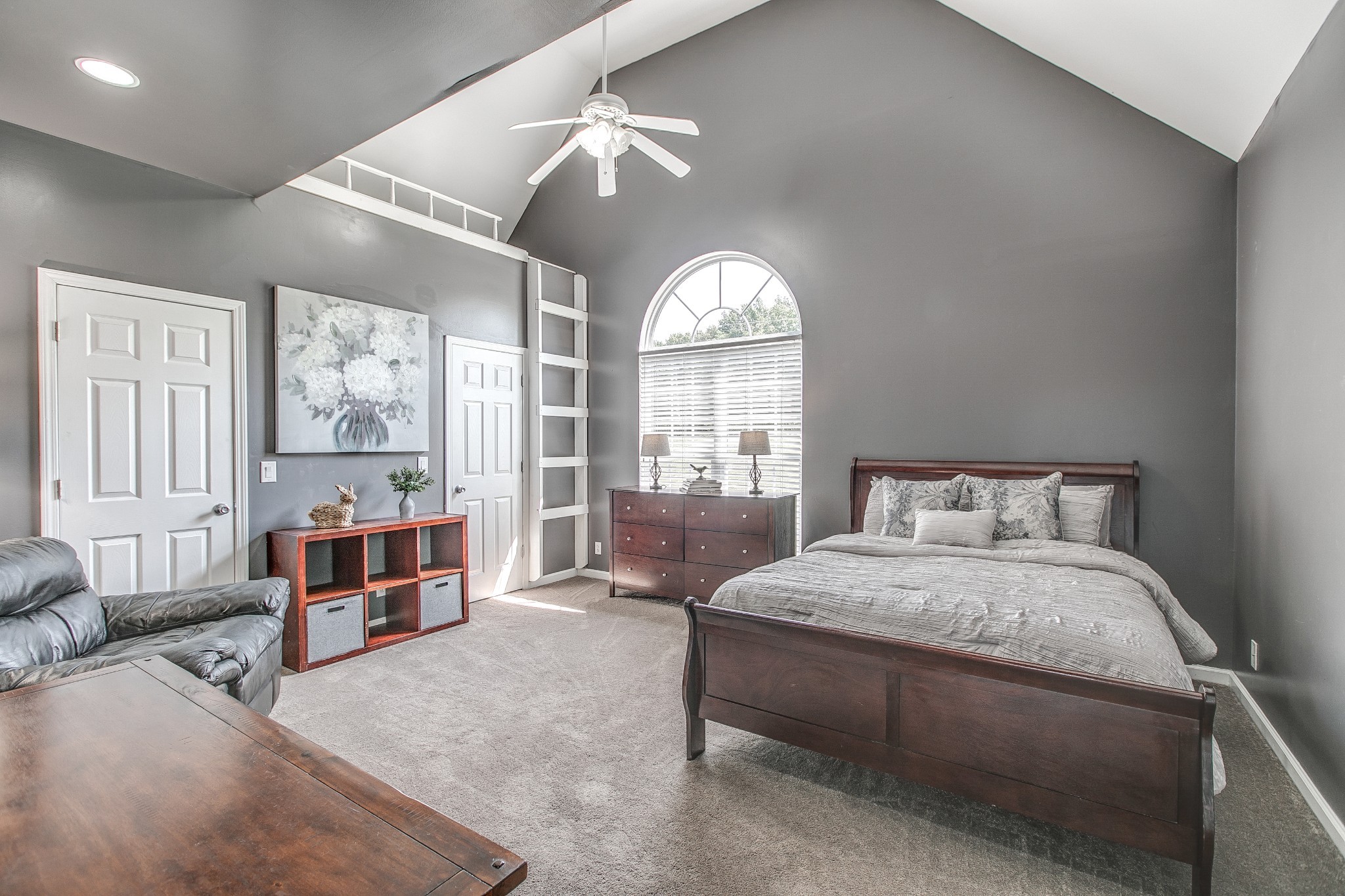 7285 North Milton Road Milton, TN 37118 - Photo 30 of 58 a bedroom with a large bed and a large window