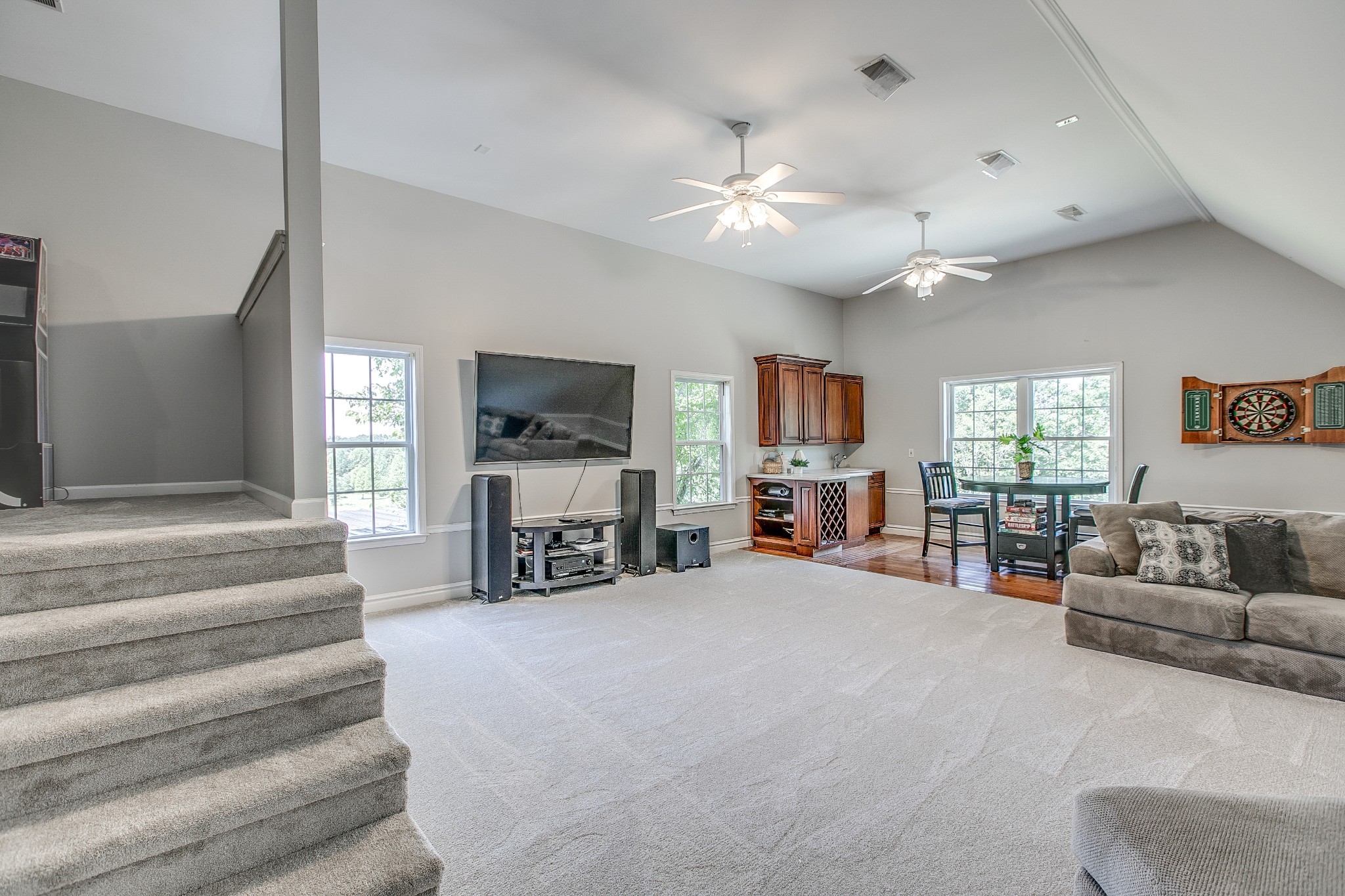 7285 North Milton Road Milton, TN 37118 - Photo 36 of 58 a large bedroom with furniture and a flat screen tv