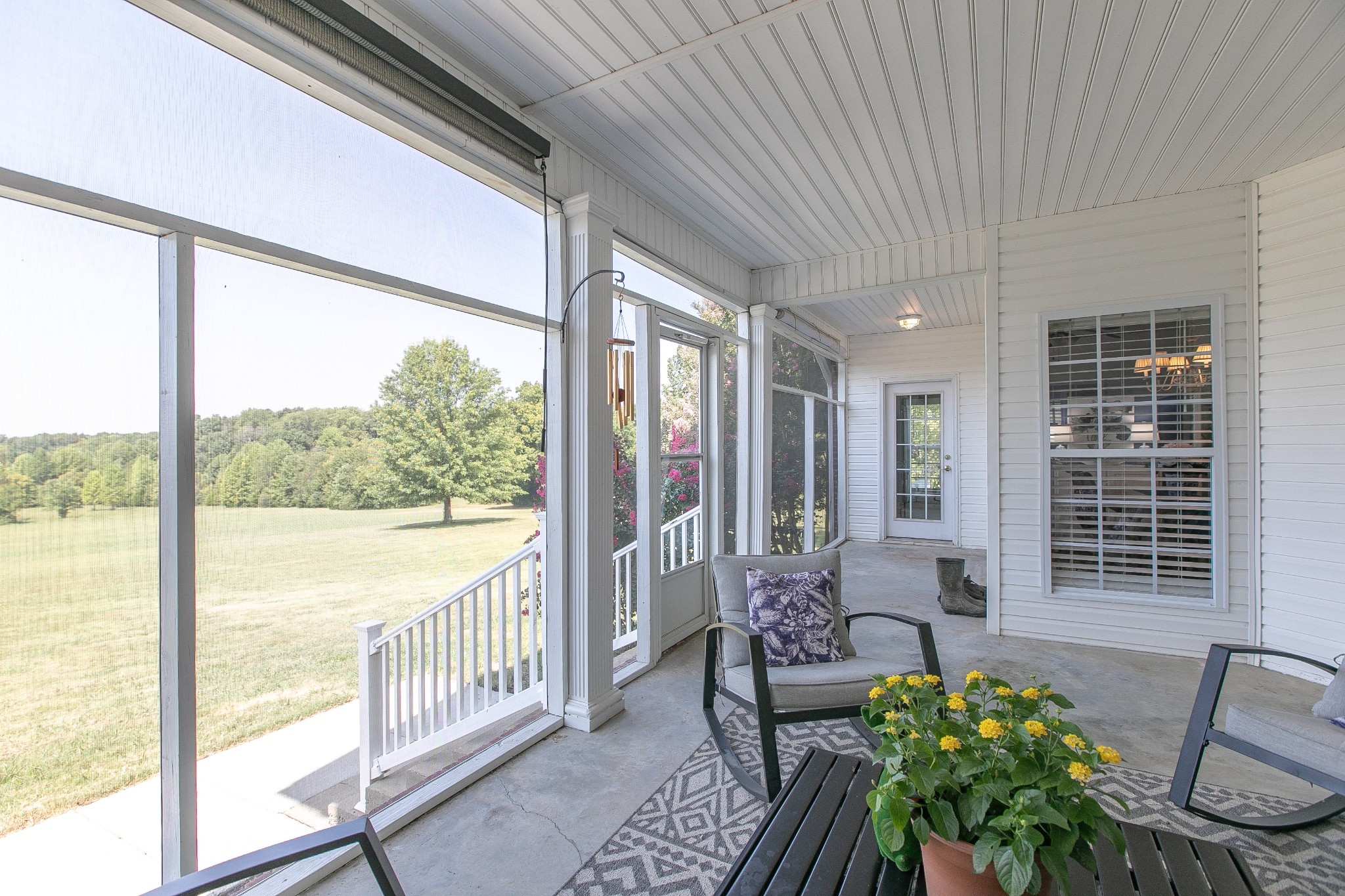 7285 North Milton Road Milton, TN 37118 - Photo 42 of 58 a living room with furniture and floor to ceiling windows