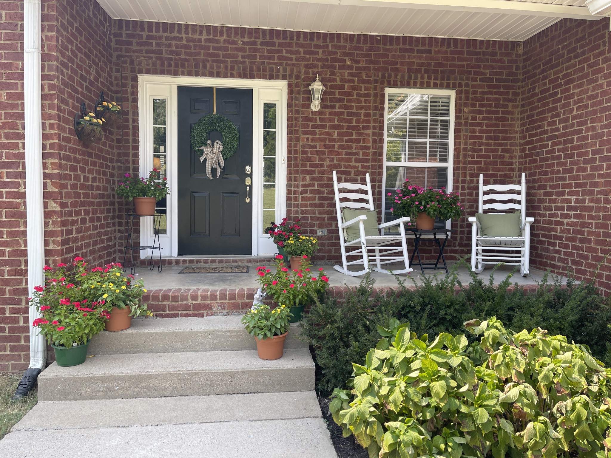 7285 North Milton Road Milton, TN 37118 - Photo 5 of 58 a view of a chair with potted plants
