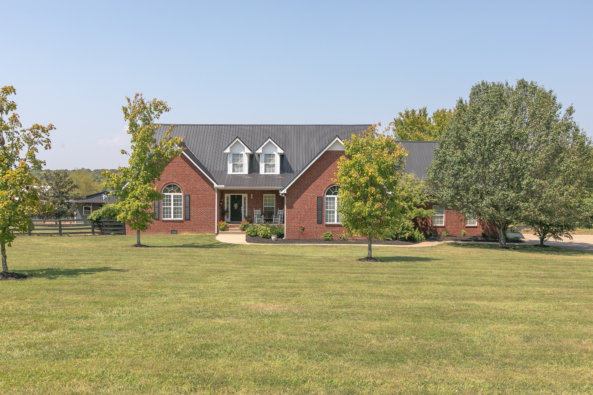 7285 North Milton Road Milton, TN 37118 - Photo 56 of 58 a house view with swimming pool in front of it