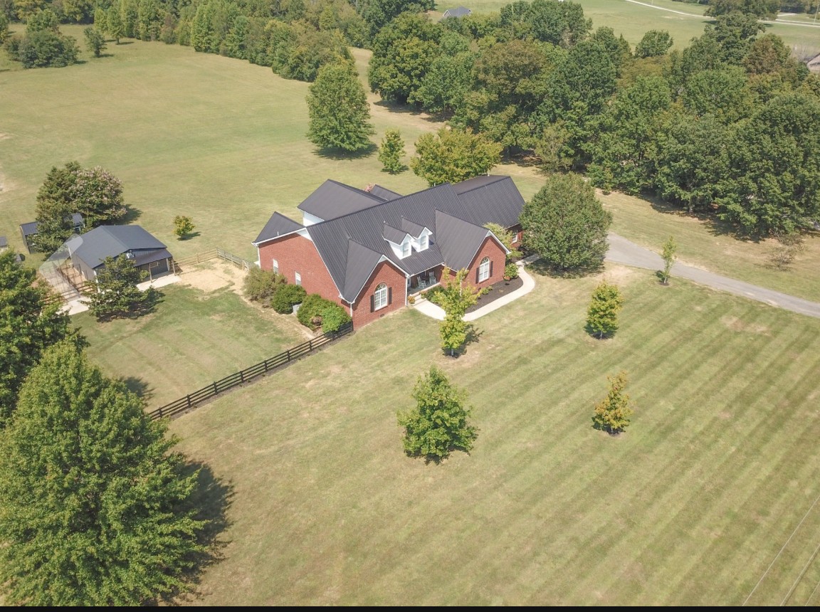 7285 North Milton Road Milton, TN 37118 - Photo 57 of 58 an aerial view of residential houses with outdoor space