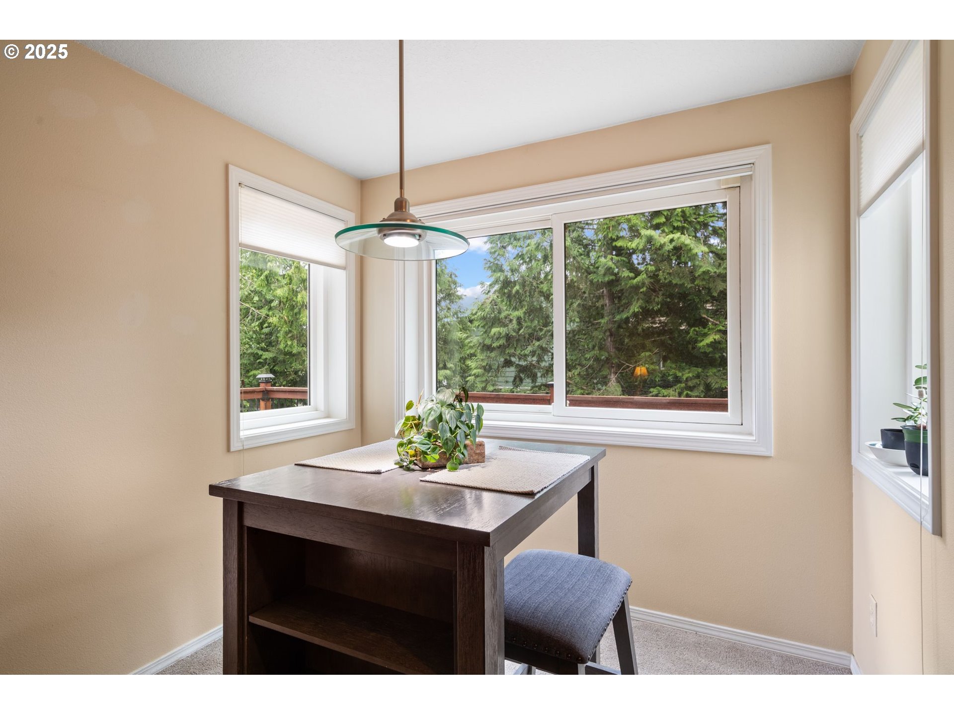 3010 Southwest Phyllis Drive Gresham, OR 97080 - Photo 15 of 48 a view of a dining room with furniture window and outside view