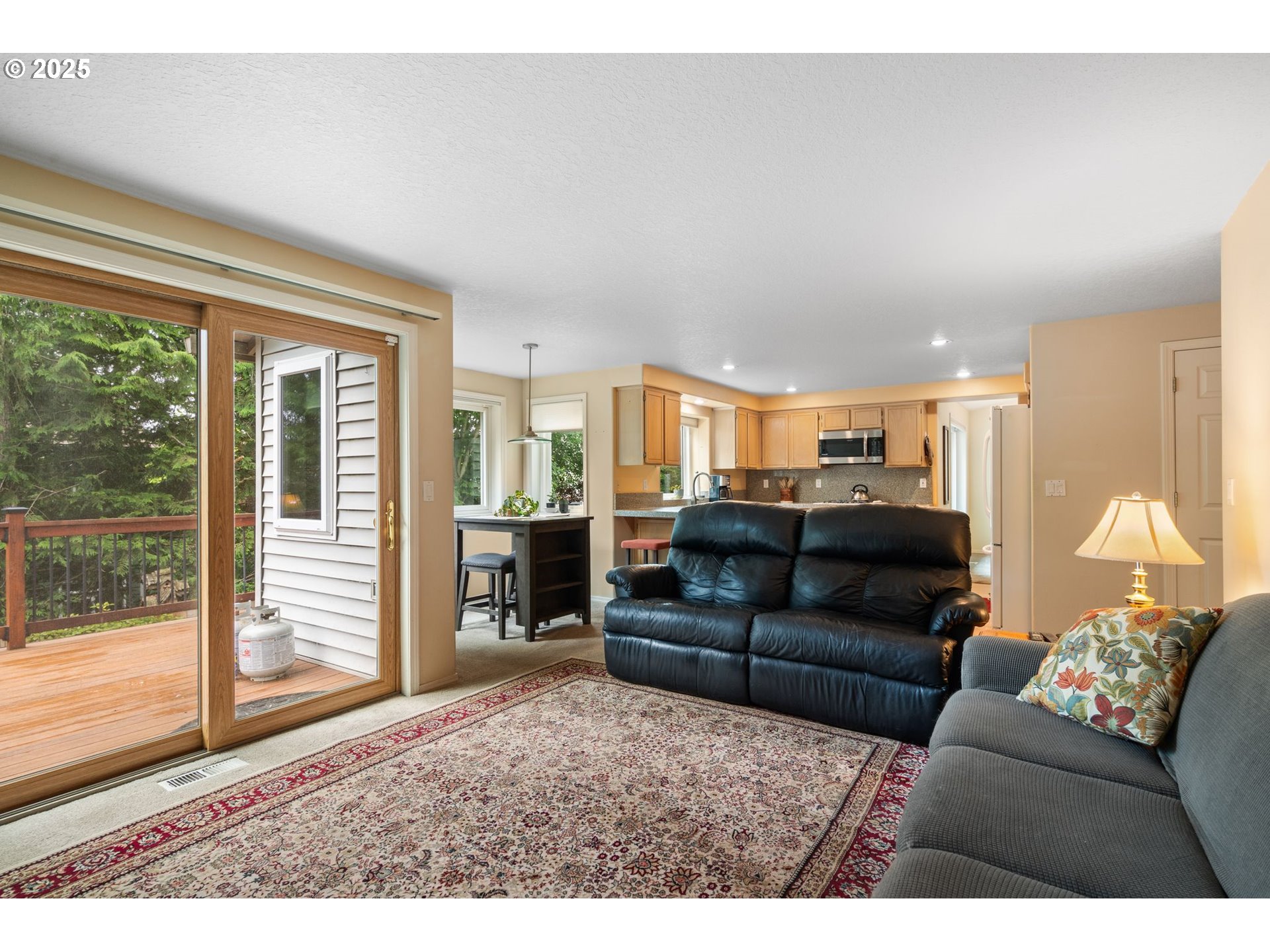 3010 Southwest Phyllis Drive Gresham, OR 97080 - Photo 19 of 48 a living room with furniture and a large window