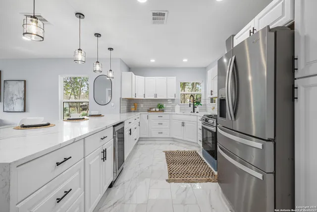 $318,800 | 1555 West Lullwood Avenue, San Antonio, TX 78201