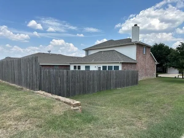 a front view of house with a yard