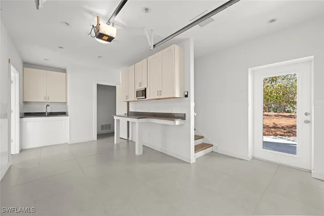 a view of cabinets and window