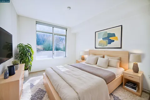 a view of a kitchen cabinets and wooden floor