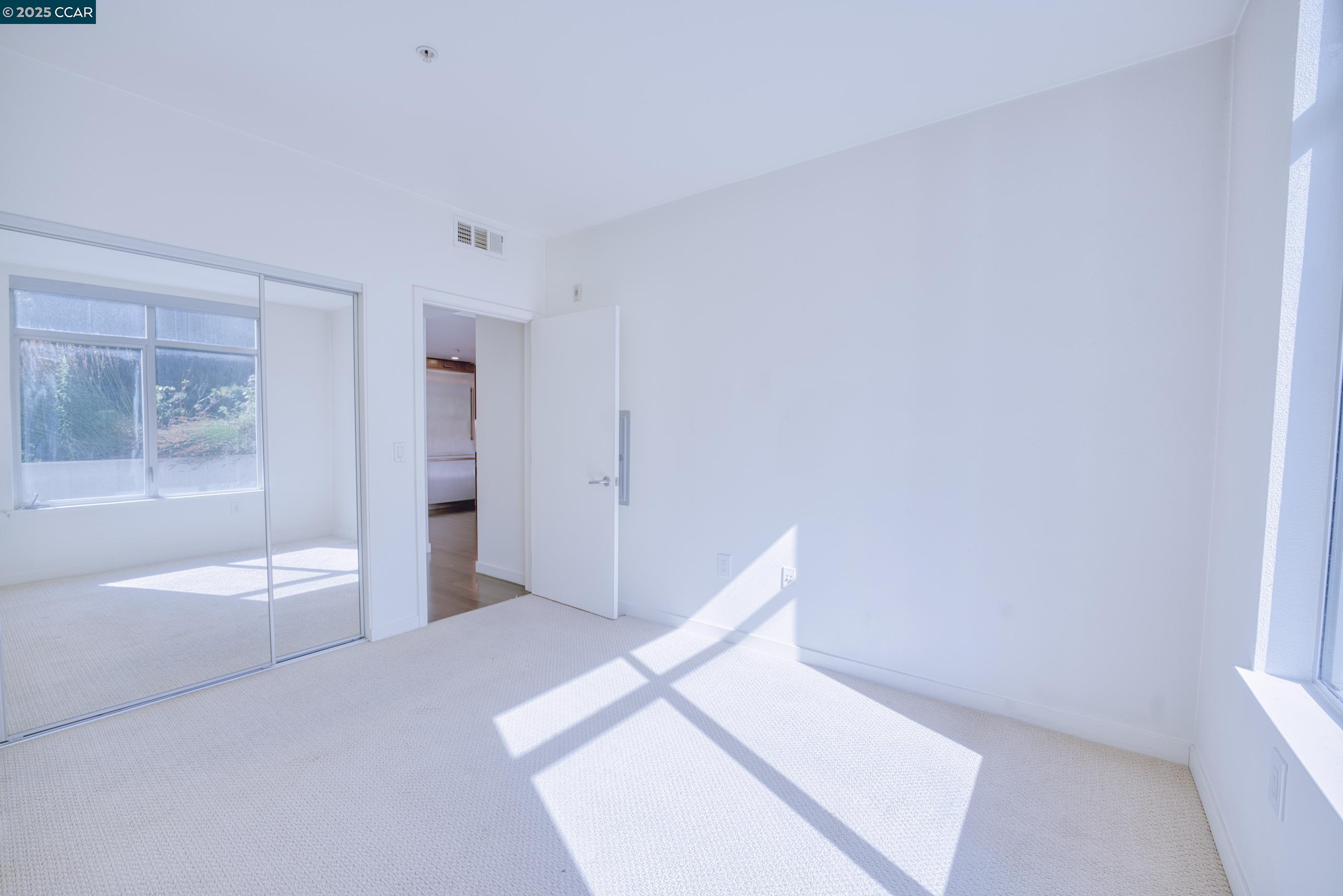 2655 Bush Street, Unit 110 San Francisco, CA 94115 - Photo 35 of 52 a spacious bathroom with a bathtub and a shower