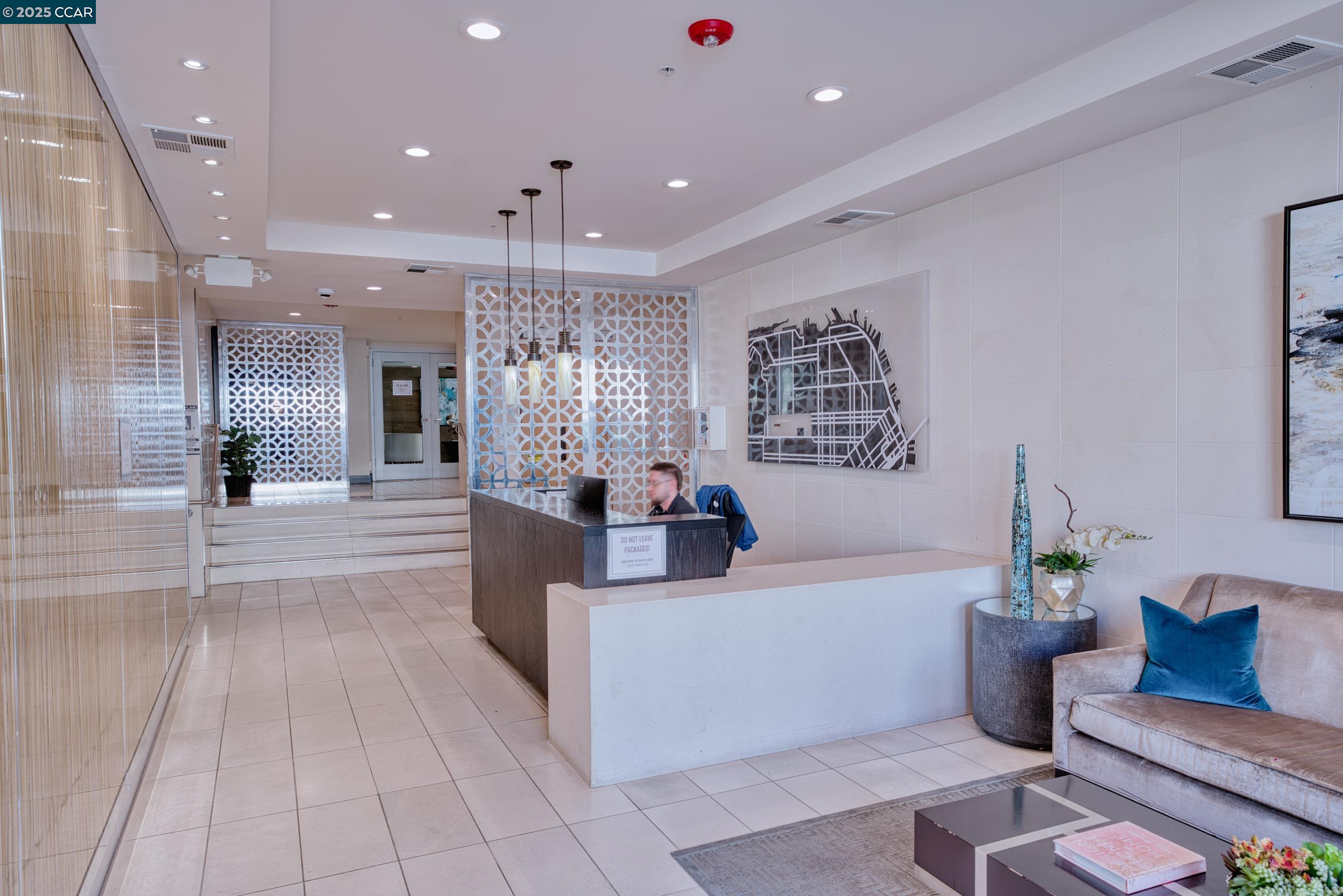 2655 Bush Street, Unit 110 San Francisco, CA 94115 - Photo 4 of 52 a living room with furniture and view of kitchen