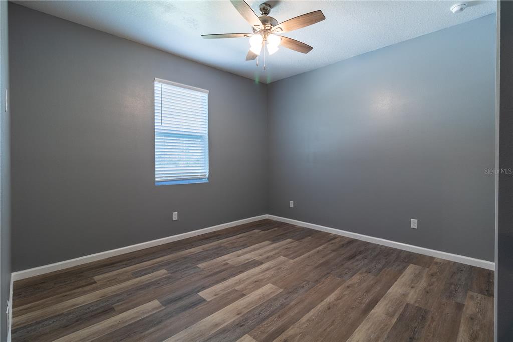 41550 Royal Trails Road Eustis, FL 32736 - Photo 17 of 25 a view of room with window and ceiling fan
