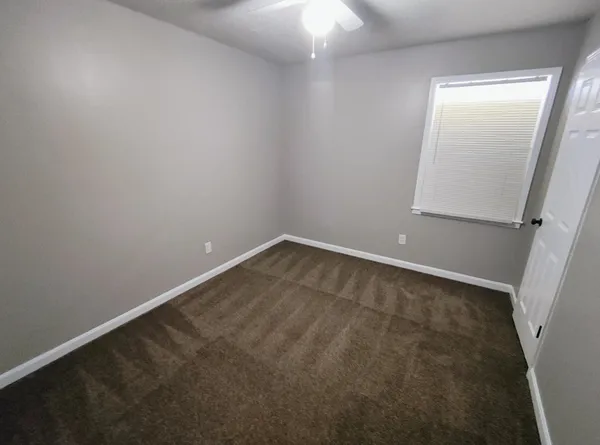 an empty room with a workbench