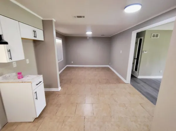 a view of a hallway with workspace