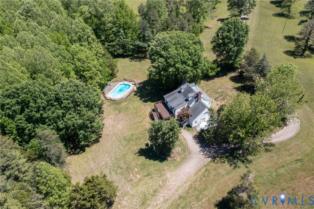 3355 Duke Road Powhatan, VA 23139 - Photo 66 of 67 an aerial view of a house with a yard and lake view