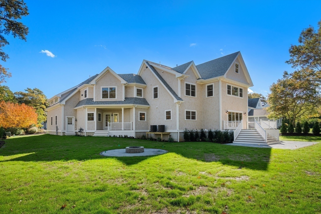 21 Quiet Street Sandwich, MA 02537 - Photo 15 of 15 a front view of a house with a yard