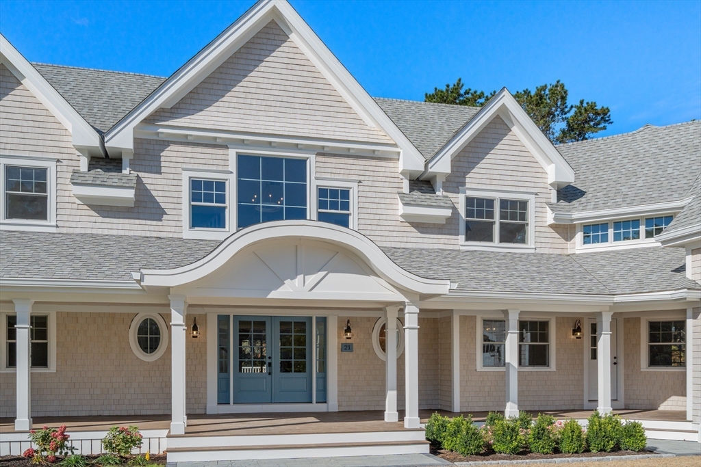 21 Quiet Street Sandwich, MA 02537 - Photo 3 of 15 a front view of a house with a garden