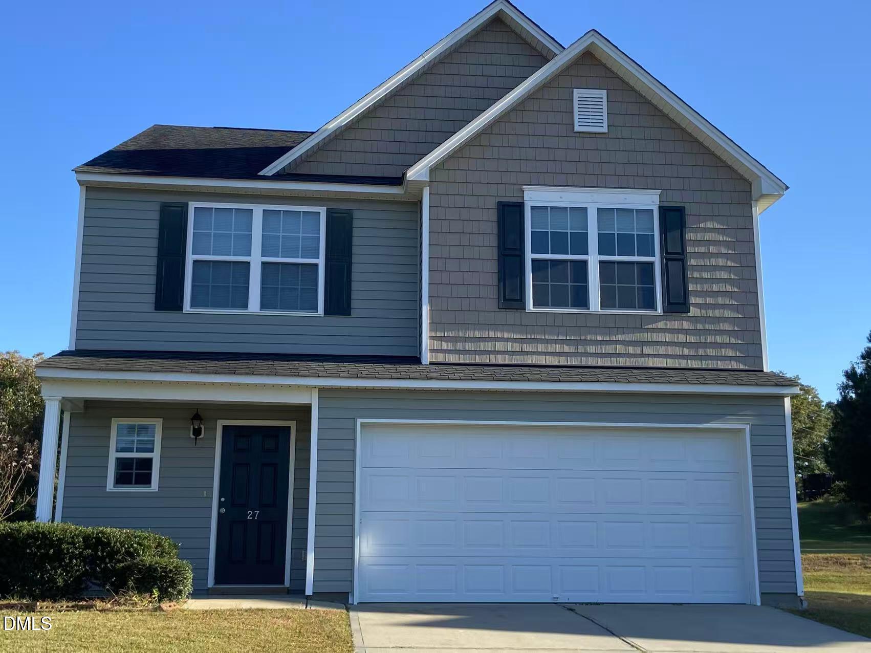 27 Ridgemoore Court Four Oaks, NC 27524 - Photo 1 of 24 a front view of a house