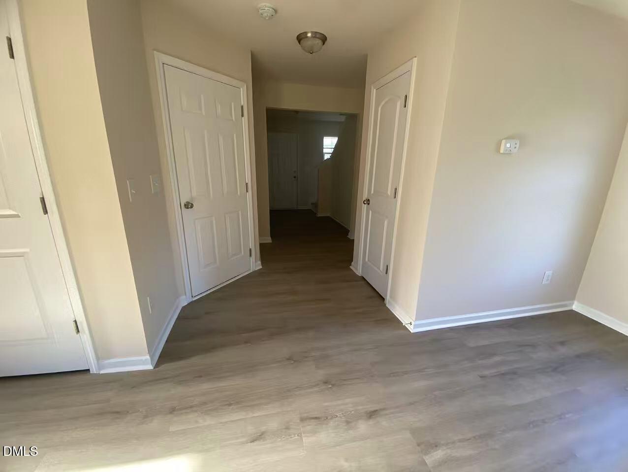 27 Ridgemoore Court Four Oaks, NC 27524 - Photo 19 of 24 a view of a hallway to rooms