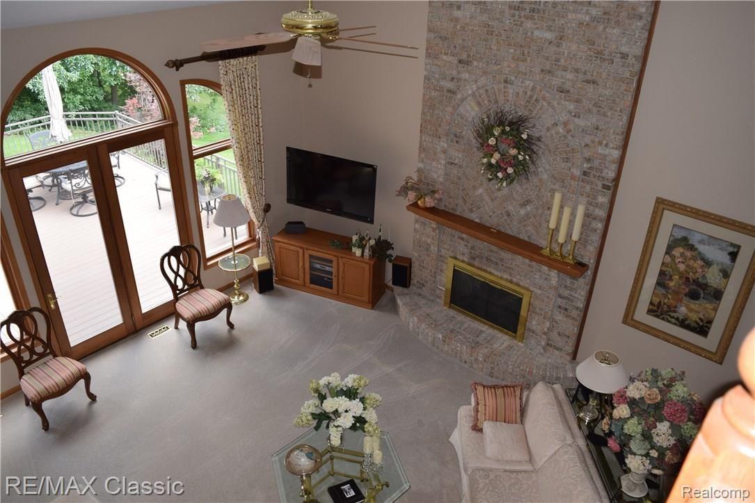 9495 Quail Ridge Run Brighton, MI 48114 - Photo 15 of 85 Natural Custom Fireplace...Beautiful!