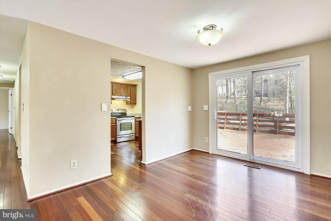 8362 Magic Leaf Road Springfield, VA 22153 - Photo 6 of 30 Dining Room w/ Sliding Glass Door To Deck