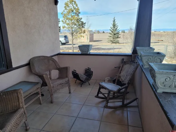 a workspace with furniture and window