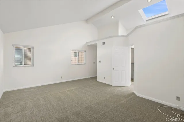 a bathroom with a granite countertop sink mirror and double