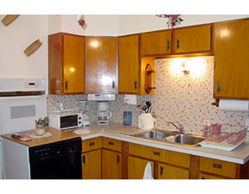 49 Redlands Street Springfield, MA 01104 - Photo 4 of 6 a kitchen with a sink and cabinets
