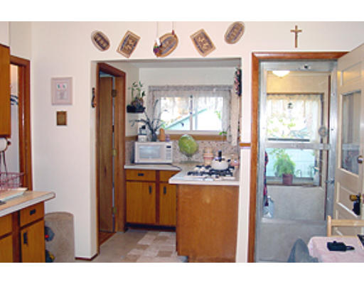 49 Redlands Street Springfield, MA 01104 - Photo 5 of 6 a bathroom with a sink a mirror and a window