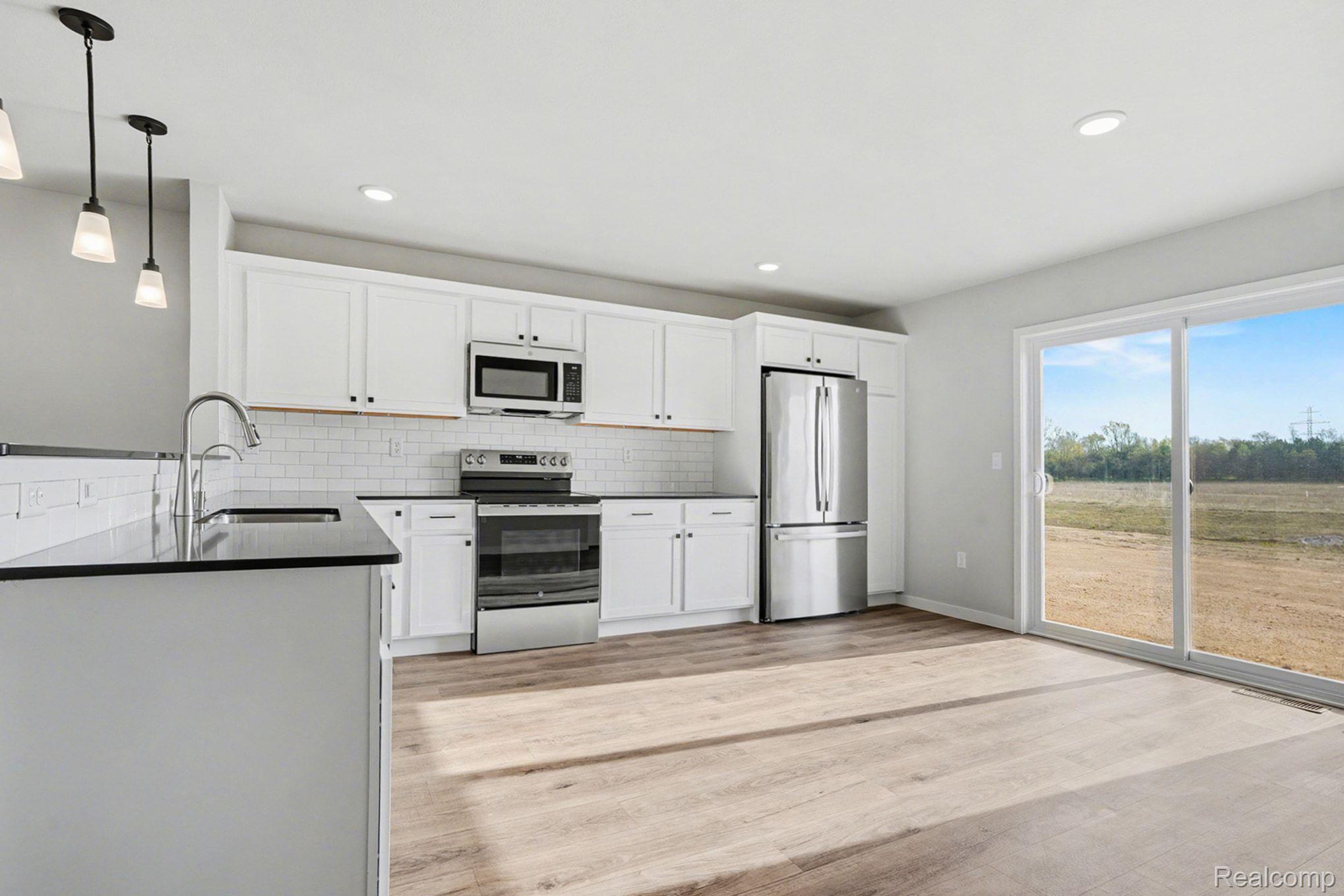 1209 Lockes Street Howell, MI 48843 - Photo 8 of 27 Stock Photo-Kitchen