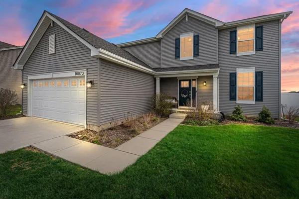 a front view of house with yard