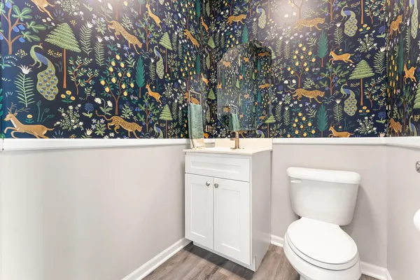 a bathroom with a toilet and a sink