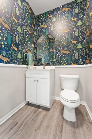 a bathroom with a toilet and a sink