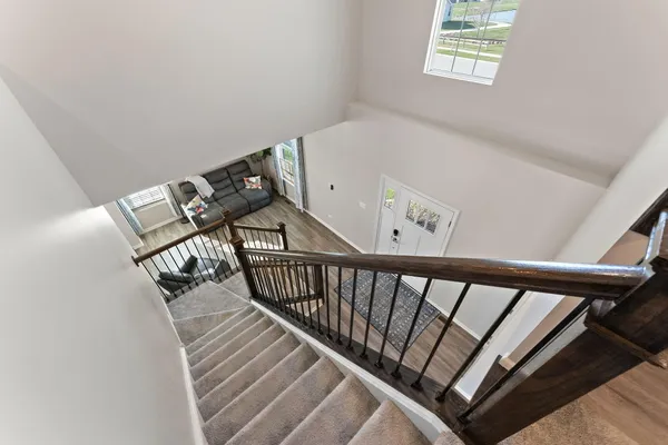 a view of a hallway with windows