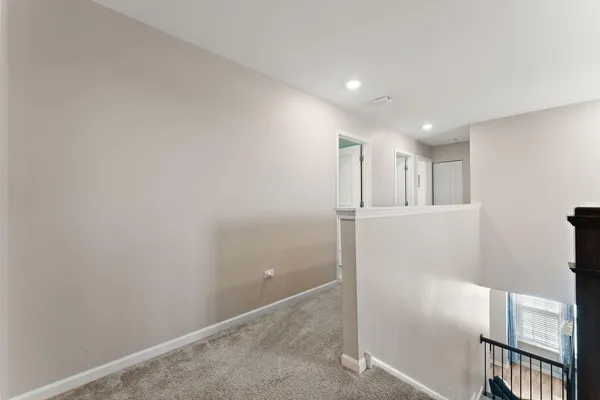 a view of cabinets and wooden floor