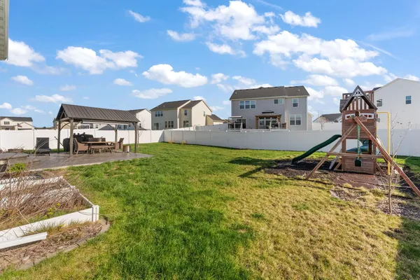 a view of a house with a park