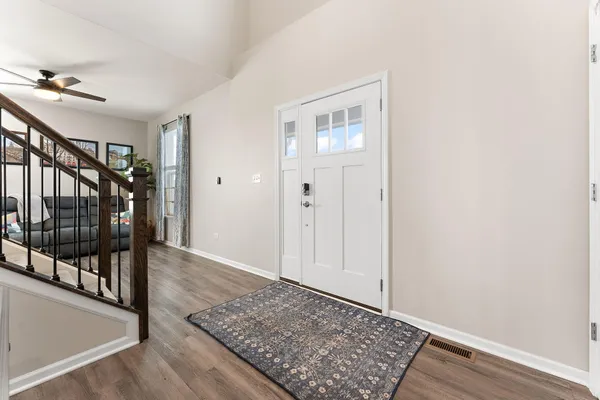 a view of entryway with stairs