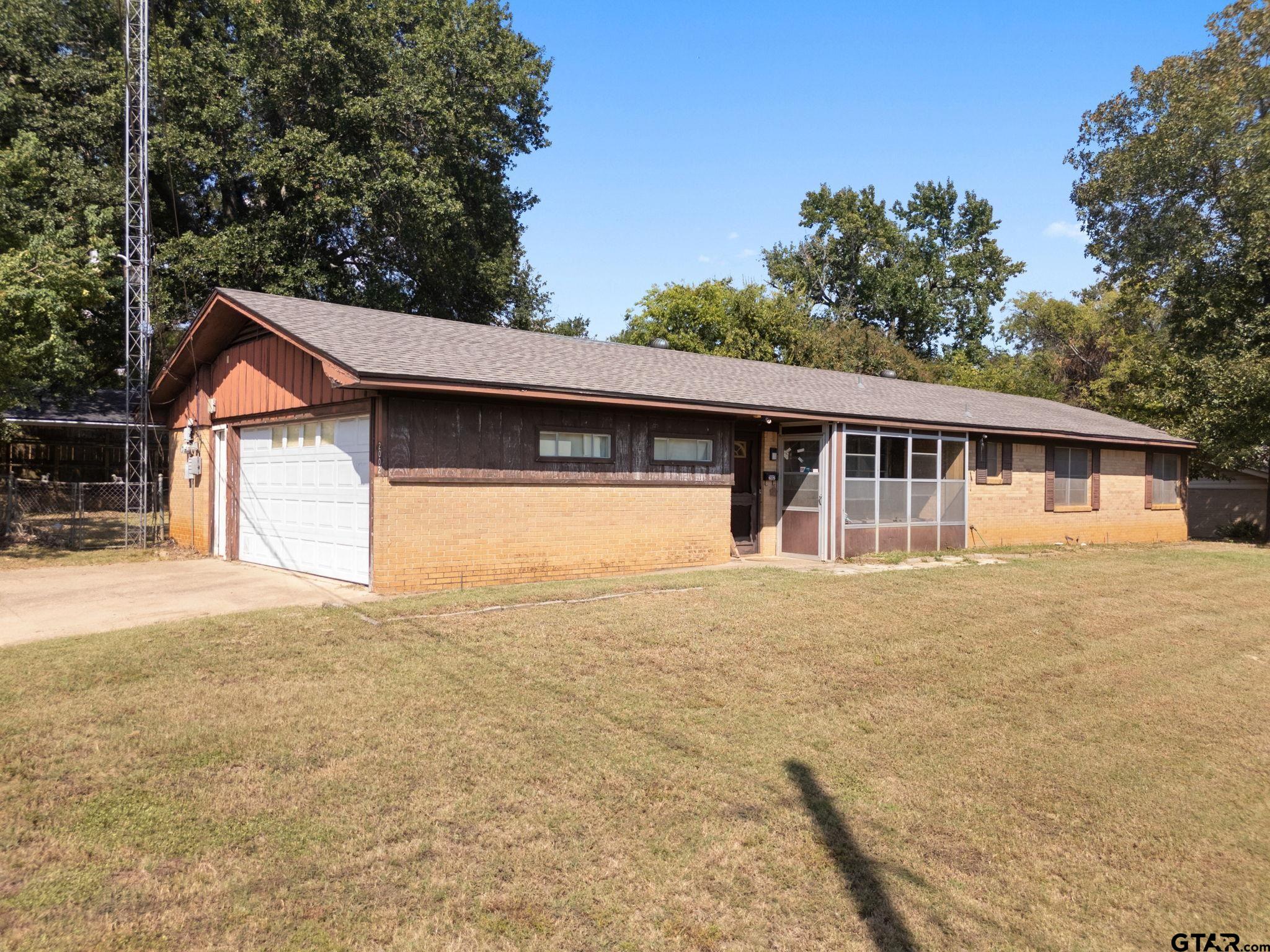 2002 Faulkner Street Tyler, TX 75701 - Photo 2 of 32 front view of house with a yard