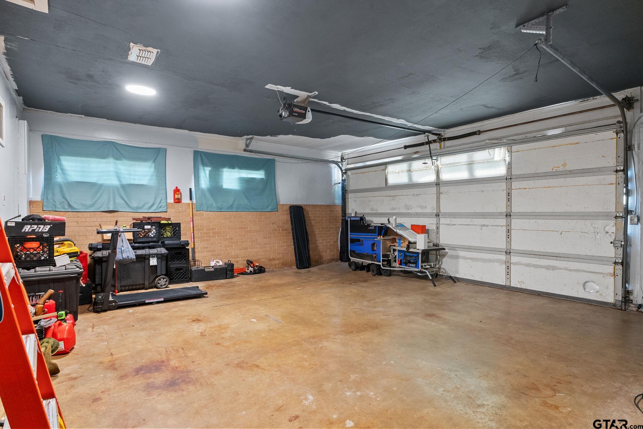 2002 Faulkner Street Tyler, TX 75701 - Photo 26 of 32 a view of a garage with storage
