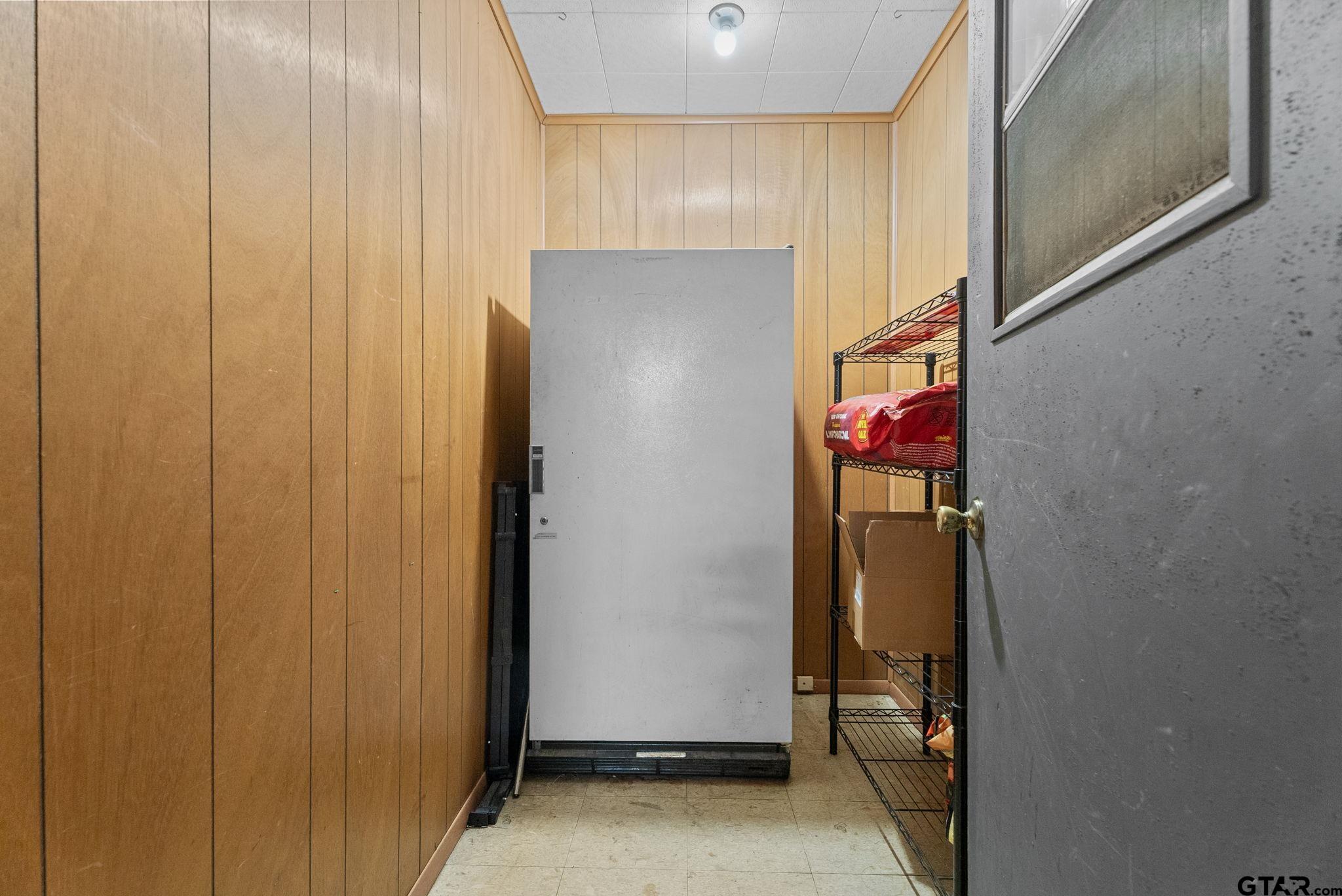 2002 Faulkner Street Tyler, TX 75701 - Photo 28 of 32 a view of a refrigerator in a kitchen